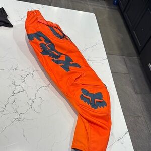 Fox Orange Motocross Pants with Bold Logos